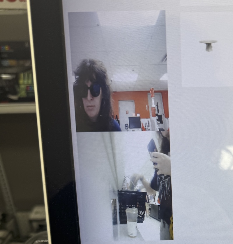 photo of the michael's register screen showing me the security camera's 2 angles of me at the register