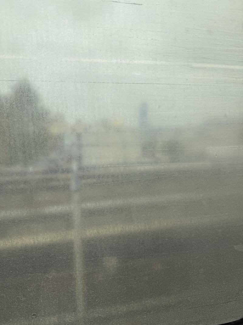 photo of a very hard to see through njtransit bus window