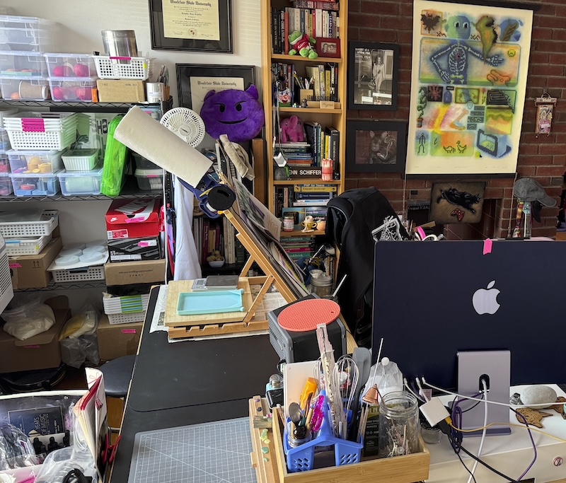 photo of my candle-making area which is on the left side of the desk (from this point of view) of my computer and main desk area