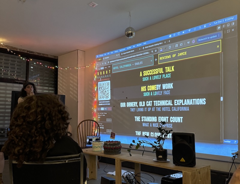 photo jamie singing "reviews of jamies" to the tune of eagles' hotel california. we're at larpa during his birthday party