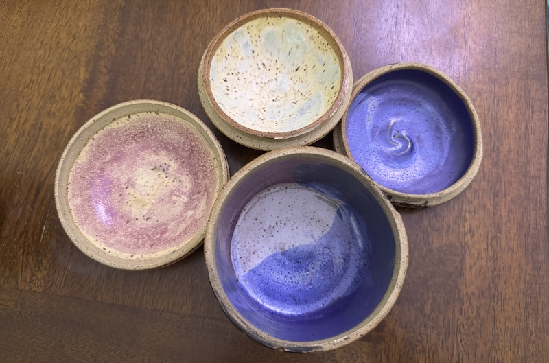 photo of inside to two closed vessels, lots of purples