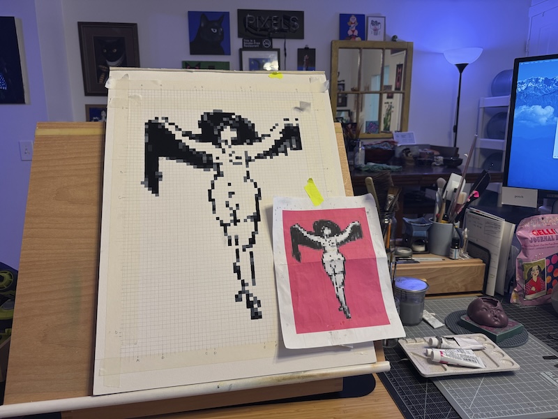 photo of my easel on my desk where i'm in the process of painting a monochrome pixel art gouache painting of a naked woman wearing a hat and holding a scarf