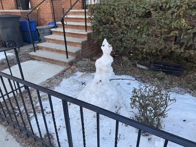 photo of a half melted snowman that i had shared the fuller version of last week before the snow melted